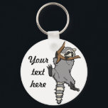 Aangepaste raccoon sleutelhanger<br><div class="desc">Oorspronkelijk getekend kunstwerk door Katy. Zoek me op Instagram @walking.on.wheels</div>