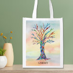 Aangepaste regenboogboom boodschappentas<br><div class="desc">Deze herbruikbare Grocery Bags zijn versierd met een mozaïekstamboom in de kleuren van de regenboog op de achtergrond van de waterverf. Gemakkelijk aanpasbaar met jouw naam. Gebruik de optie Verdere wijzigingen aanpassen om de tekstgrootte, stijl of kleur te wijzigen als u dat wenst. Omdat we ons eigen kunstwerk creëer, zal...</div>