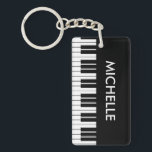 Aangepaste sleutelhanger pianosleutels voor pianis<br><div class="desc">Aangepaste pianolesleutels sleutelhanger voor pianist- of muziekdocent. Voeg je eigen naam of monogram toe. Zwart-wit ontwerp voor pianolspeler. Geschikt voor mannen,  vrouwen en kinderen. (jongen of meisje)</div>