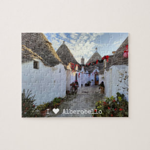Aangepaste tekst, straat met trullis in Alberobell Legpuzzel