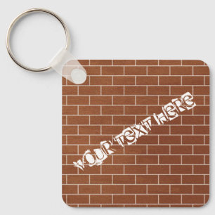 Aangepaste tekstSleutelhanger - Een brick-muur Sleutelhanger