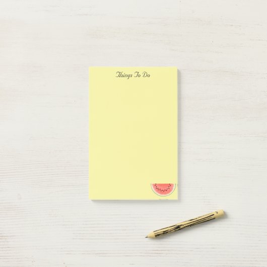 Aangepaste watermeloenvruchten op gele Post-it not Post-it® Notes (Op bureau)