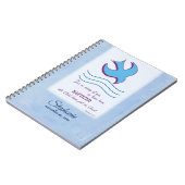 Aanpassen, volwassen borstdove op blauw notitieboek (Linkerzijde)