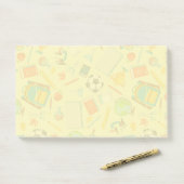 Aantekeningen op het patroon van schoolbevoorradin post-it® notes (Op bureau)