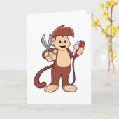 Aap als kapper met schaar en scheermes kaart (Gele Bloem)