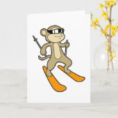 Aap als skiër met ski kaart (Gele Bloem)