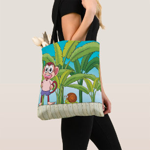 Aap en slak in tropisch junglescene tote bag