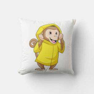 Aap in de regen met regenjas kussen