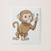 aap met tandenborstel legpuzzel (Verticaal)