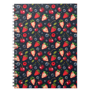Aardbeien en kersen op een donkere achtergrond notitieboek