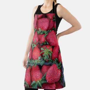 Aardbeien met groene bladeren schort