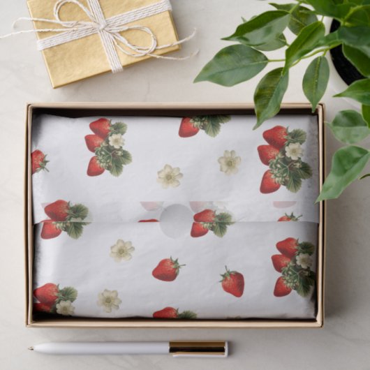 Aardbeienweefselpapier met bloesems op wit tissuepapier (Geschenk)
