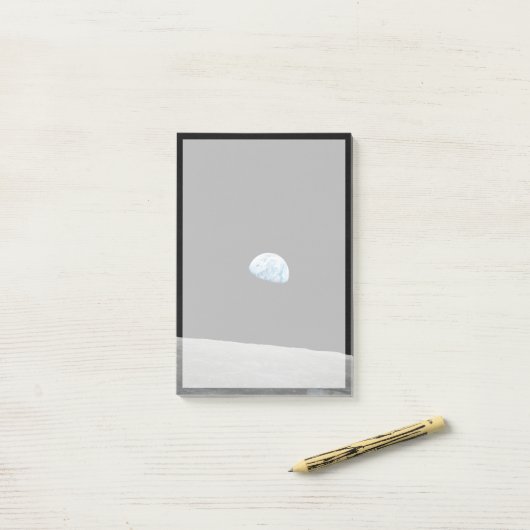 Aarde stijgt boven de maanhorizon. post-it® notes (Op bureau)