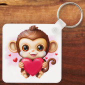 Aardige babysimiaang met een rood hart sleutelhanger (Achterkant)