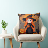 Aardige Heks in Halloween Setting met Pompoenen Kussen (Stoel)
