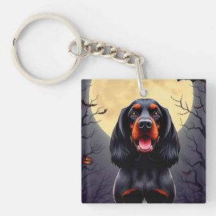 Aardige hond in Halloween scène met pompoenen Sleutelhanger