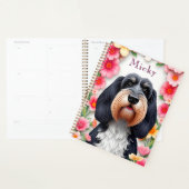 Aardige hond omlijst door bloemen planner (Display)