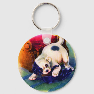 Aardige puppy uit de jaren 30 nr. 3 kauwt aan een  sleutelhanger