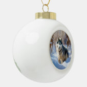 Aaskan Malamute liet het sneeuwen Kerstmis Keramische Bal Ornament (Links)