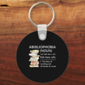 Abibliophobia definitie leuke leesboekworm sleutelhanger (Voorkant)