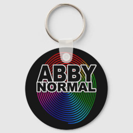Abnormale Abby Normaal gekleurd met gewarmde spira Sleutelhanger
