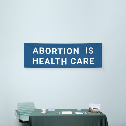 Abortus is een protestactie tegen vrouwenrechten i spandoek (Beurs)