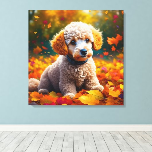 Abrikozenpuppy in herfstbladeren canvas afdruk (Insitu (Houten vloer))