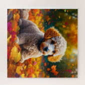 Abrikozenpuppy in herfstbladeren legpuzzel (Horizontaal)