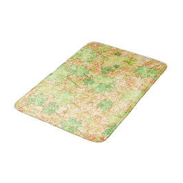 Abstract acerblad op krasbodem, op beige badmat