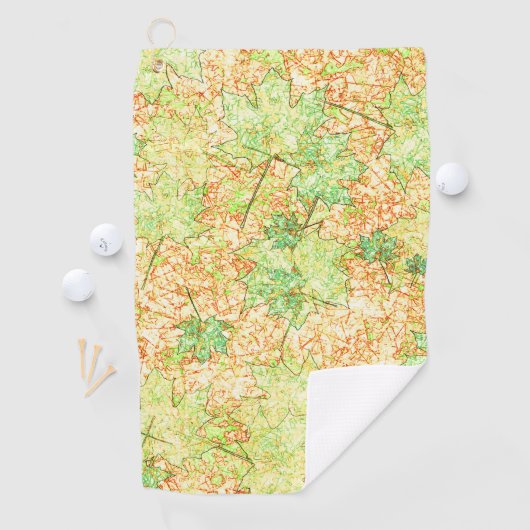 Abstract acerblad op krasbodem, op beige golfhanddoek (Insitu)