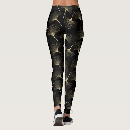 Abstract bladpatroon met zwart en licht goud leggings (Achterkant)