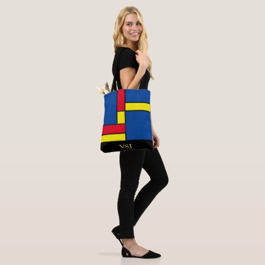 Abstract blauw rood en geel monogram tote bag (Op model)