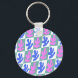 Abstract, geïnspireerd lef Plant gecontroleerd Sleutelhanger<br><div class="desc">Matisse geïnspireerde bladdrukkerij,  met groene cheques met blauw en roze snijblad van plant. Gecontroleerde roze en blauwe bladeren afdrukken. Abstract ontwerp van het scharrelbord met kromming van het plant.</div>