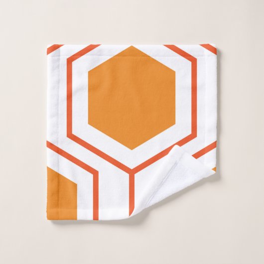 Abstract geometrical pattern in oranje and bad handdoek (Wasdoekje)
