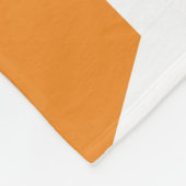 Abstract geometrical pattern in oranje and fleece deken (Hoek)