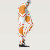 Abstract geometrical pattern in oranje and leggings (Rechts)