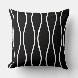 Abstract golvend geometrisch patroon op zwart kussen