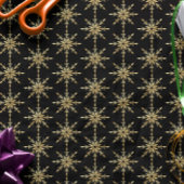 Abstract gouden sneeuwvlokpatroon cadeaupapier