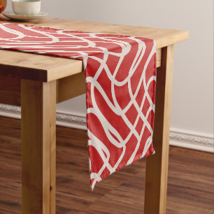 Abstract lijnpatroon van rood en crème korte tafelloper