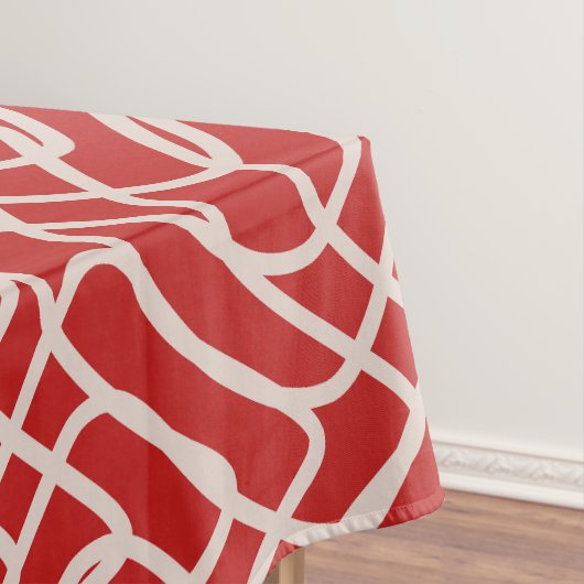 Abstract lijnpatroon van rood en crème tafelkleed (Voorbeeld)