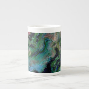 Abstract ontwerp van wervelende levendige kleuren porselein kop