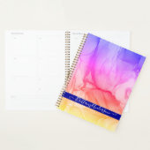 Abstract regenboogvloeistofpatroonjaar planner (Display)