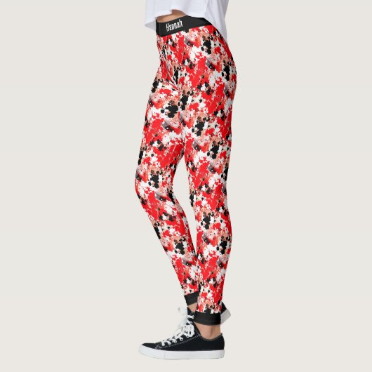 Abstract rood wit zwart schilderplaatjespatroon leggings (Links)