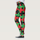 Abstract rood, zwart en groen leggings (Links)