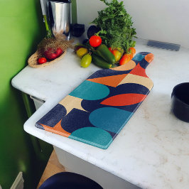 Abstract veelkleurig geometrisch vormenpatroon snijplank