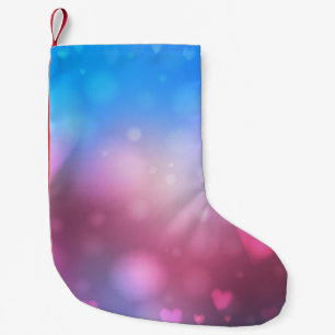 Abstract vloeiend blauw en roze achtergrond met kleine kerstsok