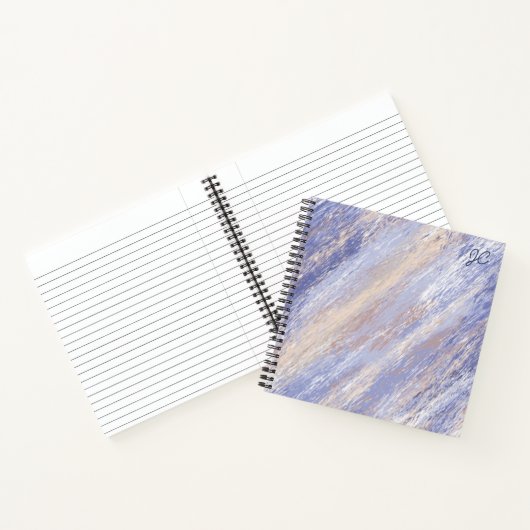 Abstracte blauwe en beige verfstreken in een romme notitieboek (Binnen)