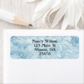 abstracte blauwe veren en sneeuwvlokken etiket (Insitu)