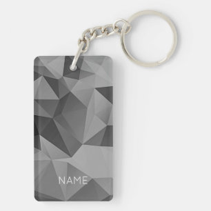 Abstracte geometrische grijze ontwerpnaam sleutelhanger
