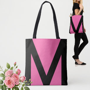 Abstracte geometrische vorm in zwart en neonroze tote bag